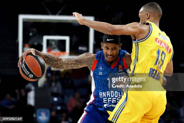 Will Clyburn of Anadolu Efes in action against Louis Olinde of Alba Berlin during the Turkish Airlines EuroLeague week 31 basketball match between...