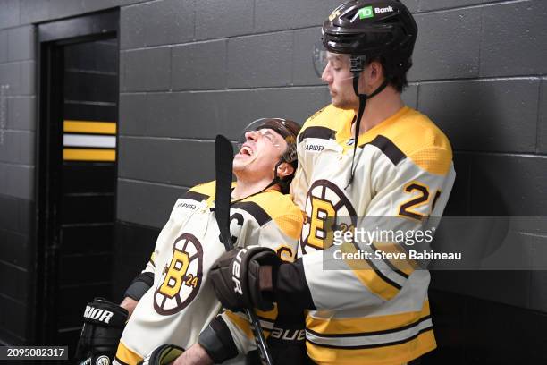 Brad Marchand and Brandon Carlo of the Boston Bruins in the hallway before the game against the New York Rangers at the TD Garden on March 21, 2024...