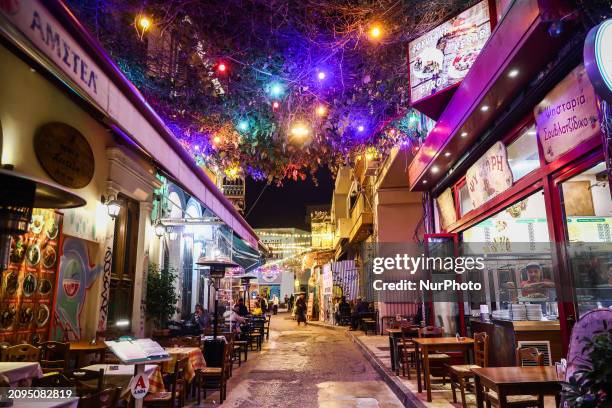 Restaurant gardens at Psyri neighbourhood in Athens, Greece on March 15th, 2024. Psyri is one of the most fashionable and trendy district in the city...