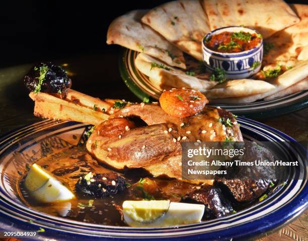 Rbatee Tagine, lamb in a Moroccan stew with cinnamon, almonds and honey and garnished with hard boiled eggs at Marrakesh - Authentic Moroccan Cuisine...