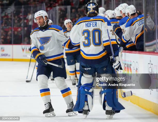 Brandon Saad of the St. Louis Blues celebrates his first period goal against the Ottawa Senators with teammate Joel Hofer at Canadian Tire Centre on...