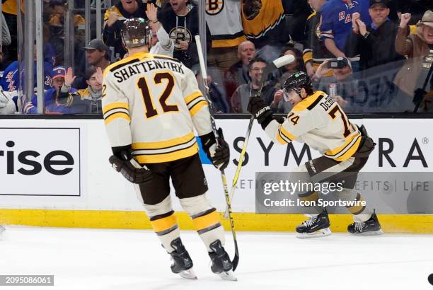 Boston Bruins left wing Jake DeBrusk celebrates his goal during a game between the Boston Bruins and the New York Rangers on March 21 at TD Garden in...