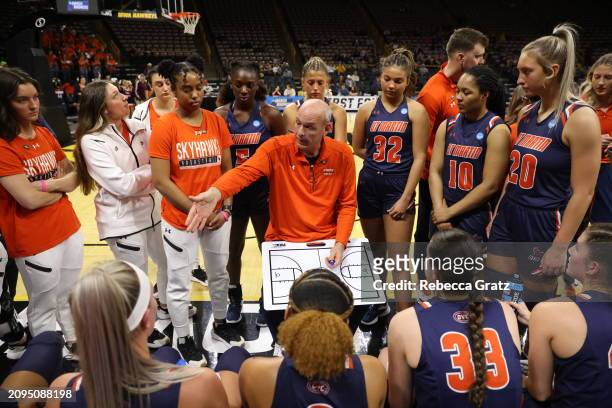 Head coach Kevin McMillan of the UT Martin Skyhawks talks to his team during a timeout in the first quarter against the Holy Cross Crusaders during...