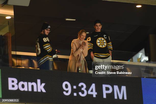 Singer Celine Dion and her sons after the game of the Boston Bruins against the New York Rangers at the TD Garden on March 21, 2024 in Boston,...