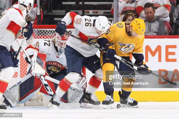 Uvis Balinskis and goaltender Sergei Bobrovsky the Florida Panthers defend against Jason Zucker of the Nashville Predators in the second period at...