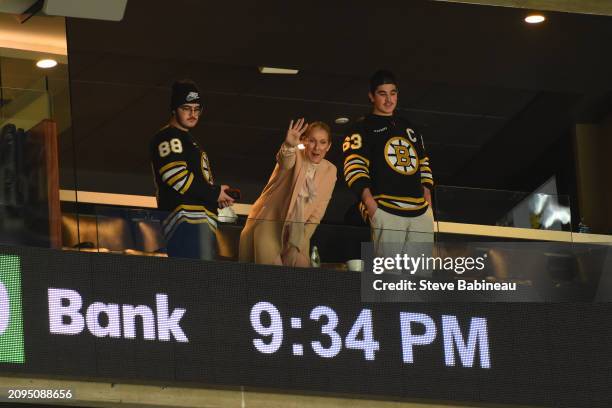 Singer Celine Dion waves to fans after the game of the Boston Bruins against the New York Rangers at the TD Garden on March 21, 2024 in Boston,...