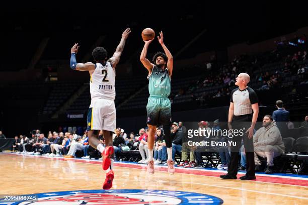 Kaiser Gates of the Long Island Nets shoots the ball against the Indiana Mad Ants on March 21, 2024 at Nassau Coliseum in Uniondale, New York. NOTE...