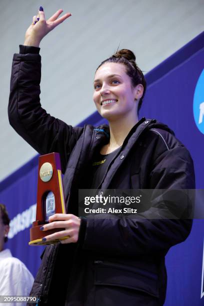 Alex Walsh of the Virginia Cavaliers poses with the trophy after winning the Women's 200 Yard Individual Medley finals during the Division I Women's...