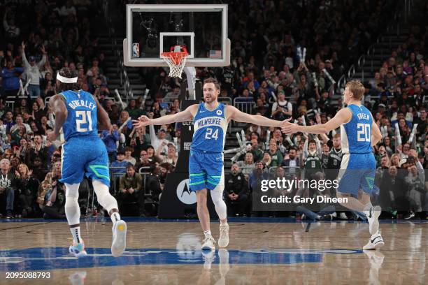 Pat Connaughton of the Milwaukee Bucks celebrates three point basket during the game against the Brooklyn Nets on March 21, 2024 at the Fiserv Forum...