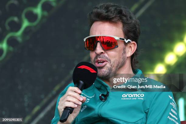 Fernando Alonso of Spain and Aston Martin Aramco F1 Team speaks during practice ahead of the F1 Grand Prix of Australia at Albert Park Circuit on...