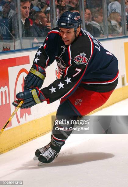 Scott Lachance of the Columbus Blue Jackets skates against the Toronto Maple Leafs during NHL game action on February 12, 2004 at Air Canada Centre...