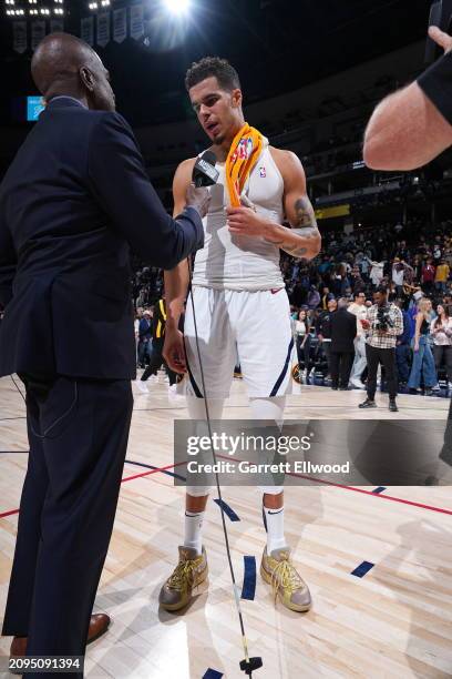 Michael Porter Jr. #1 of the Denver Nuggets talks to the media after the game against the New York Knicks on March 21, 2024 at the Ball Arena in...