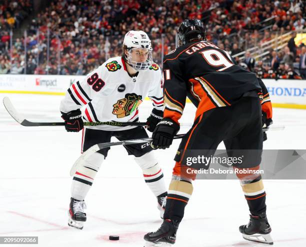 1st draft pick Connor Bedard of the Chicago Blackhawks and 2nd draft pick Leo Carlsson of the Anaheim Ducks get ready for the puck drop during the...