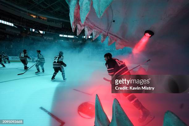Marc-Edouard Vlasic of the San Jose Sharks takes the ice through the Shark Head before the game against the Tampa Bay Lightning at SAP Center on...