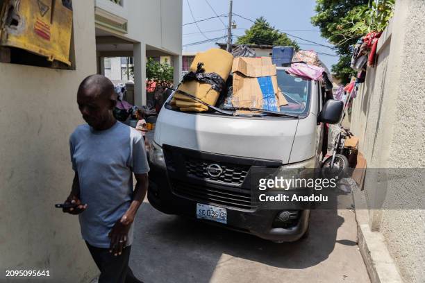 The Ministry of Communication's car becomes a dormitory for the homeless, amid the ongoing insecurity and political instability in Port-au-Prince,...
