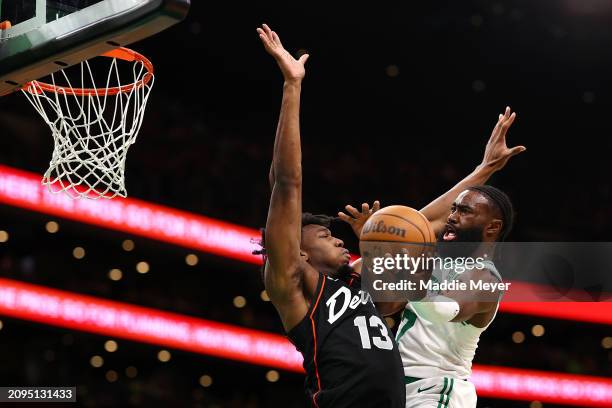 Jaylen Brown of the Boston Celtics takes a shot against James Wiseman of the Detroit Pistons during the first quarter at TD Garden on March 18, 2024...