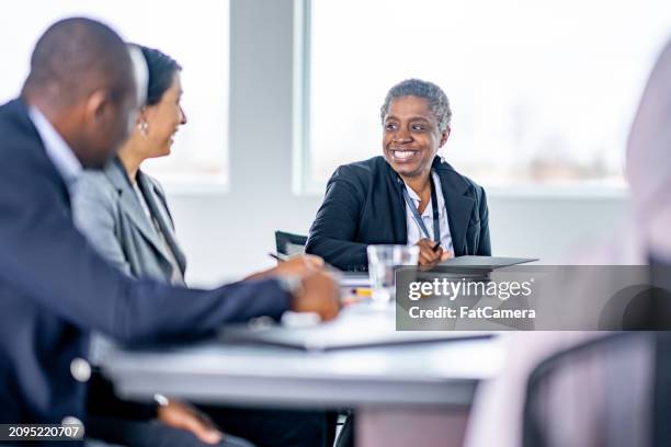 formal business meeting - african american formal event stock pictures, royalty-free photos & images