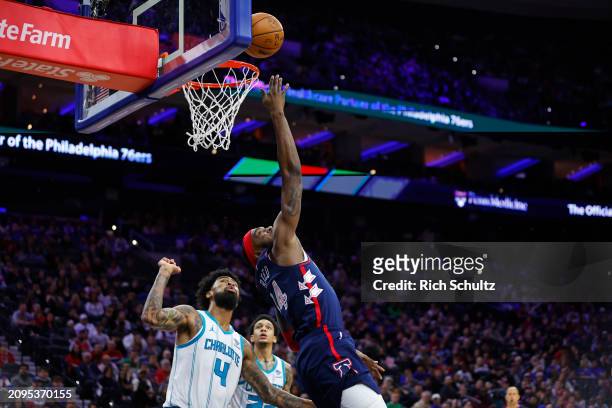 Paul Reed of the Philadelphia 76ers in action against Nick Richards of the Charlotte Hornets during a game at the Wells Fargo Center on March 16,...