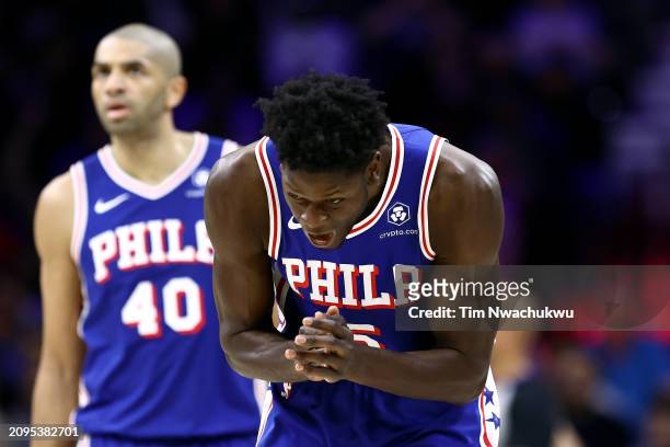 Mo Bamba of the Philadelphia 76ers reacts during the third quarter against the Miami Heat at the Wells Fargo Center on March 18, 2024 in...