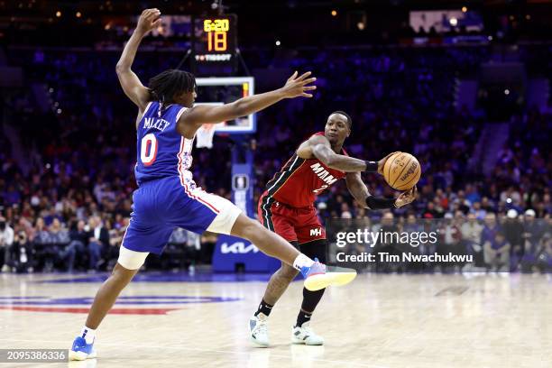 Tyrese Maxey of the Philadelphia 76ers guards as Terry Rozier of the Miami Heat passes during the third quarter at the Wells Fargo Center on March...