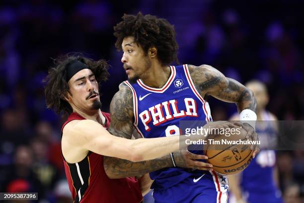 Jaime Jaquez Jr. #11 of the Miami Heat guards Kelly Oubre Jr. #9 of the Philadelphia 76ers during the third quarter at the Wells Fargo Center on...