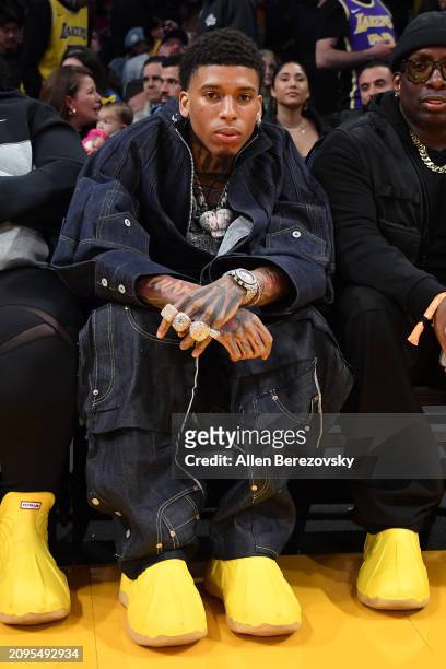 Rapper NLE Choppa attends a basketball game between the Los Angeles Lakers and the Atlanta Hawks at Crypto.com Arena on March 18, 2024 in Los...