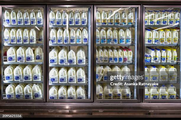 Milk displayed in a fridge inside at a supermarket on March 19, 2024 in Melbourne, Australia. Australia's two major supermarket chains, Coles and...
