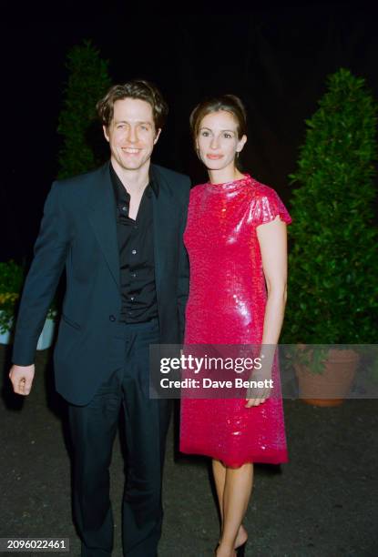 English actor Hugh Grant and American actor Julia Roberts attend a party at the Belvedere restaurant in Holland Park to celebrate the UK film...