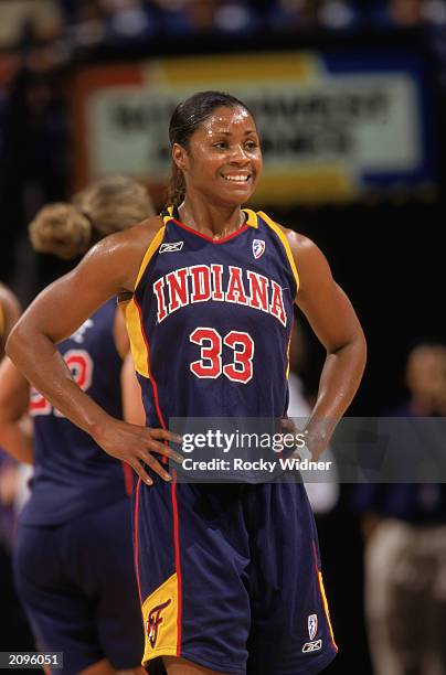 Niele Ivey of the Indiana Fever looks on against the Sacramento Monarchs during the WNBA game at ARCO arena on June 14, 2003 in Sacramento,...