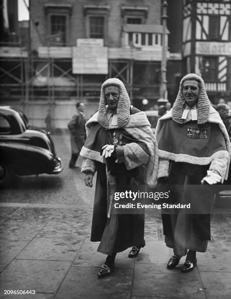 Justice Benjamin Ormerod left, and Justice Geoffrey Streatfield walking in their wigs and gowns outside the Royal Courts of Justice, London, October...