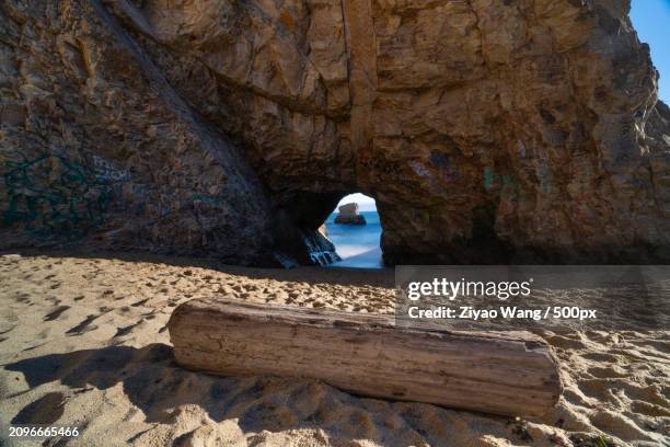 scenic view of rock formation in sea at beach,santa cruz,california,united states,usa - cruz stock pictures, royalty-free photos & images