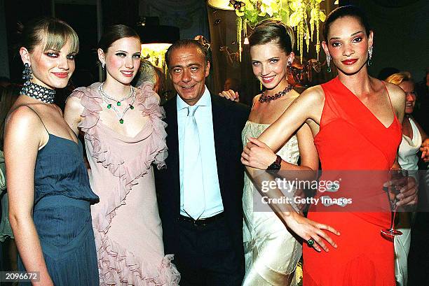 Fawaz Grossi and models attend a fashion show organised by Fawaz Grossi showcasing Galliano designs and Maison de Grisogne jewellery June 18, 2003 in...