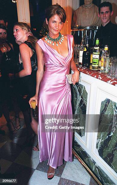 Model Helena Christensen attends a fashion show organised by Fawaz Grossi showcasing Galliano designs and Maison de Grisogne jewellery June 18, 2003...