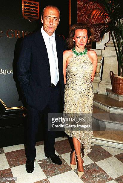 Fawaz Grossi and an unidentified guest attend a fashion show organised by Fawaz Grossi showcasing Galliano designs and Maison de Grisogne jewellery...