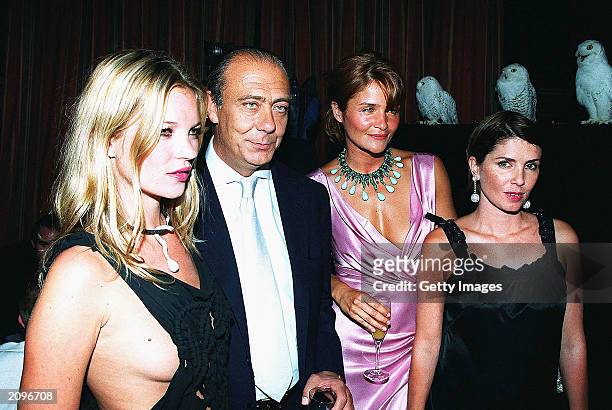 Model Kate Moss, Fawaz Grossi, model Helena Christensen and actress Sadie Frost attend a fashion show organised by Fawaz Grossi showcasing Galliano...