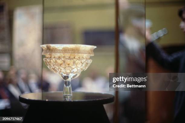 The Roman glass cage-cup, dated circa AD 300, which sold for a record sum of £520,000 at Sotheby's in, London, June 4th 1979 to British dealer Robin...