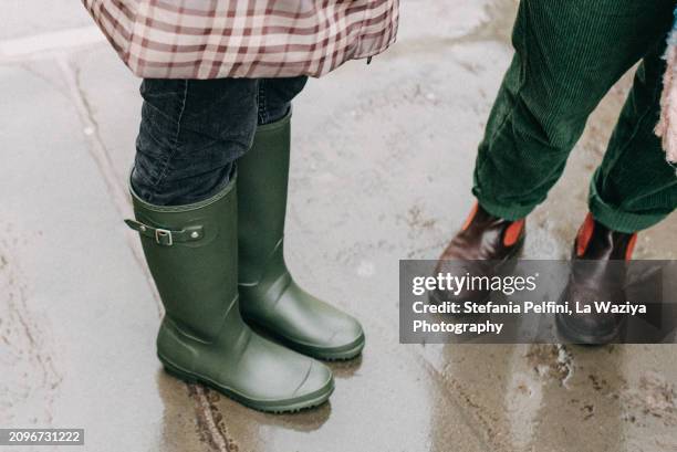 close up on rain boots - shoe boot stock pictures, royalty-free photos & images