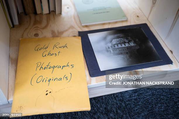 Files and images are displayed at the Museum of Art in Norrkoping, Sweden on March 12, 2024. Press clippings, books and first-hand accounts of people...