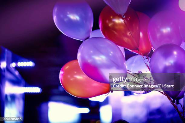 balloons at nightclub - balloon stock pictures, royalty-free photos & images