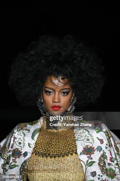 Model walks the runway at the Sheguang Hu Collection sshow at Beijing Fashion Week AW2024.on March 19, 2024 in Beijing, China.