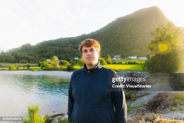 happy man enjoying summer weekend by scenic seashore - norwegian culture stock pictures, royalty-free photos & images