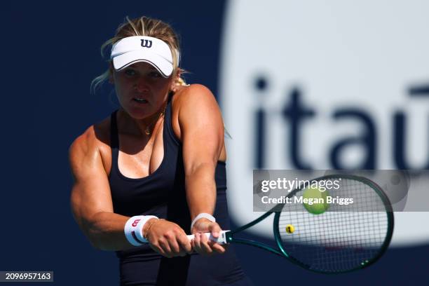 Peyton Stearns of the United States returns a shot to Yafan Wang of China during her women's singles match during the Miami Open at Hard Rock Stadium...