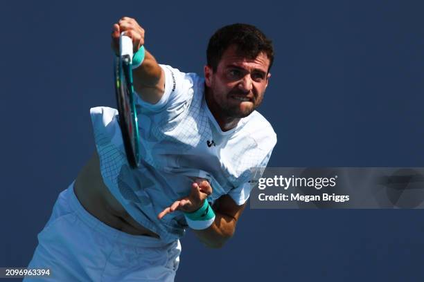 Pedro Martinez of Spain serves to Adam Walton of Australia during his men's singles match during the Miami Open at Hard Rock Stadium on March 19,...