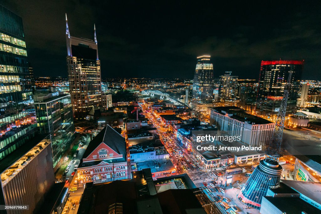 Elevated View of Broadway, Downtown Nashville at Night, featuring "Batman Building" and Ryman Auditorium