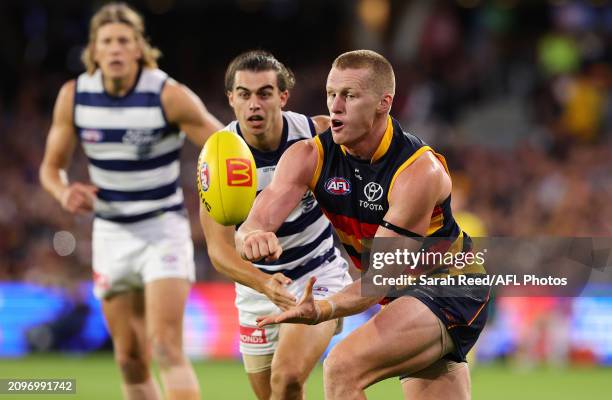 Reilly O'Brien of the Crows and Oisin Mullin of the Cats during the 2024 AFL Round 2 match between the Adelaide Crows and the Geelong Cats at...