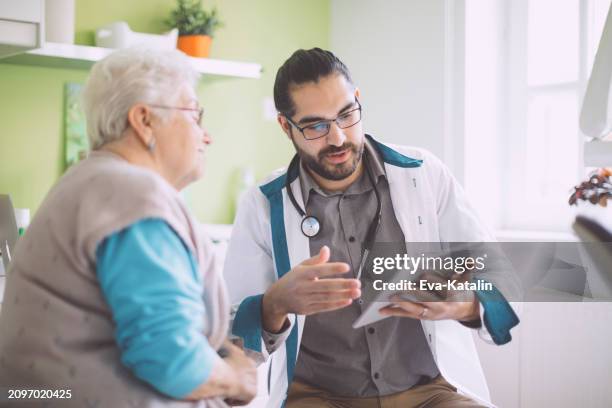 doctor consulting her patient - metabolic syndrome stock pictures, royalty-free photos & images