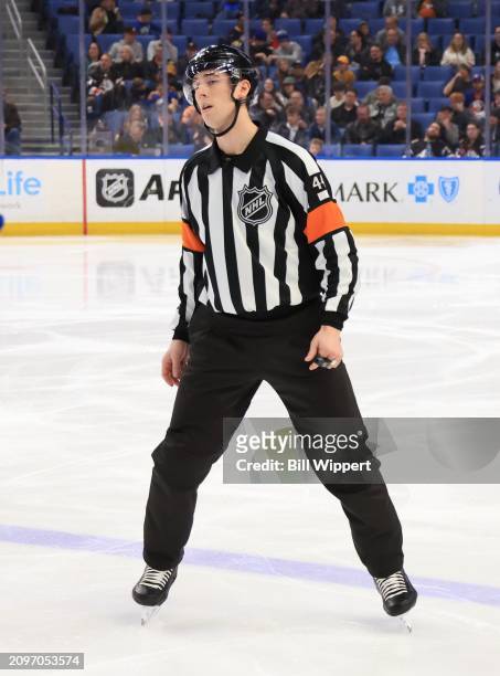 Referee Justin Kea works during an NHL game between the Buffalo Sabres and the New York Islanders on March 14, 2024 at KeyBank Center in Buffalo, New...