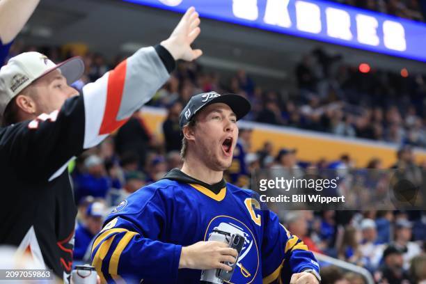 Buffalo Sabres fans celebrate during an NHL game against the New York Islanders on March 14, 2024 at KeyBank Center in Buffalo, New York.