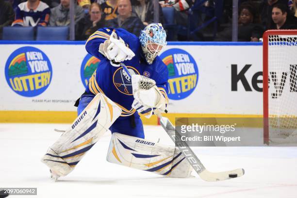 Ukko-Pekka Luukkonen of the Buffalo Sabres passes the puck during an NHL game against the New York Islanders on March 14, 2024 at KeyBank Center in...