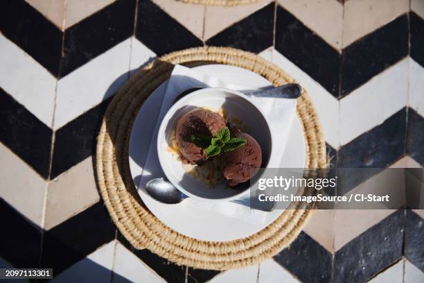 view directly above bowl of chocolate ice cream - place mat stock pictures, royalty-free photos & images